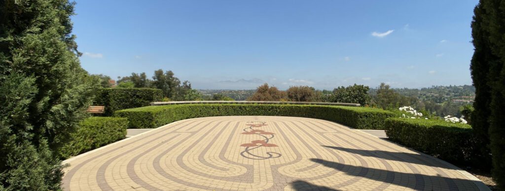 A Stone Walkway with a Circular Pattern
